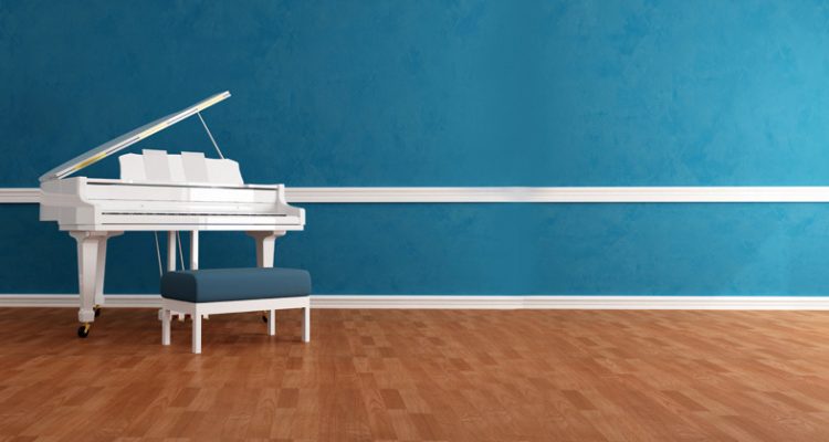 white gran piano in blue interior